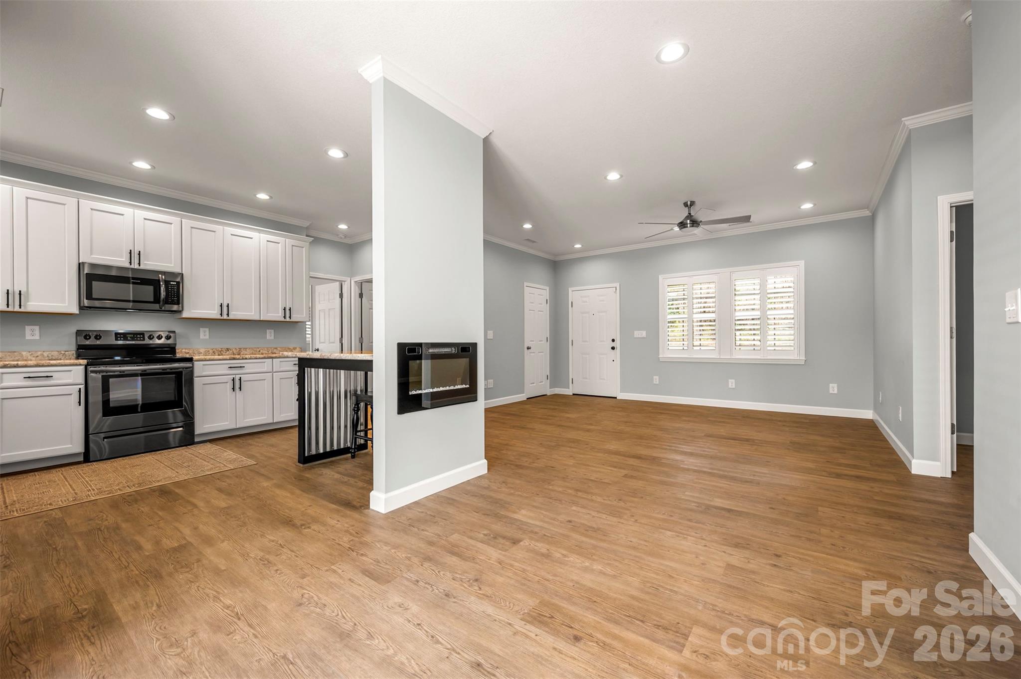 168 Nursery Road Forest City, NC 28043 - Photo 11 of 30 a view of kitchen with kitchen island microwave and stove top oven