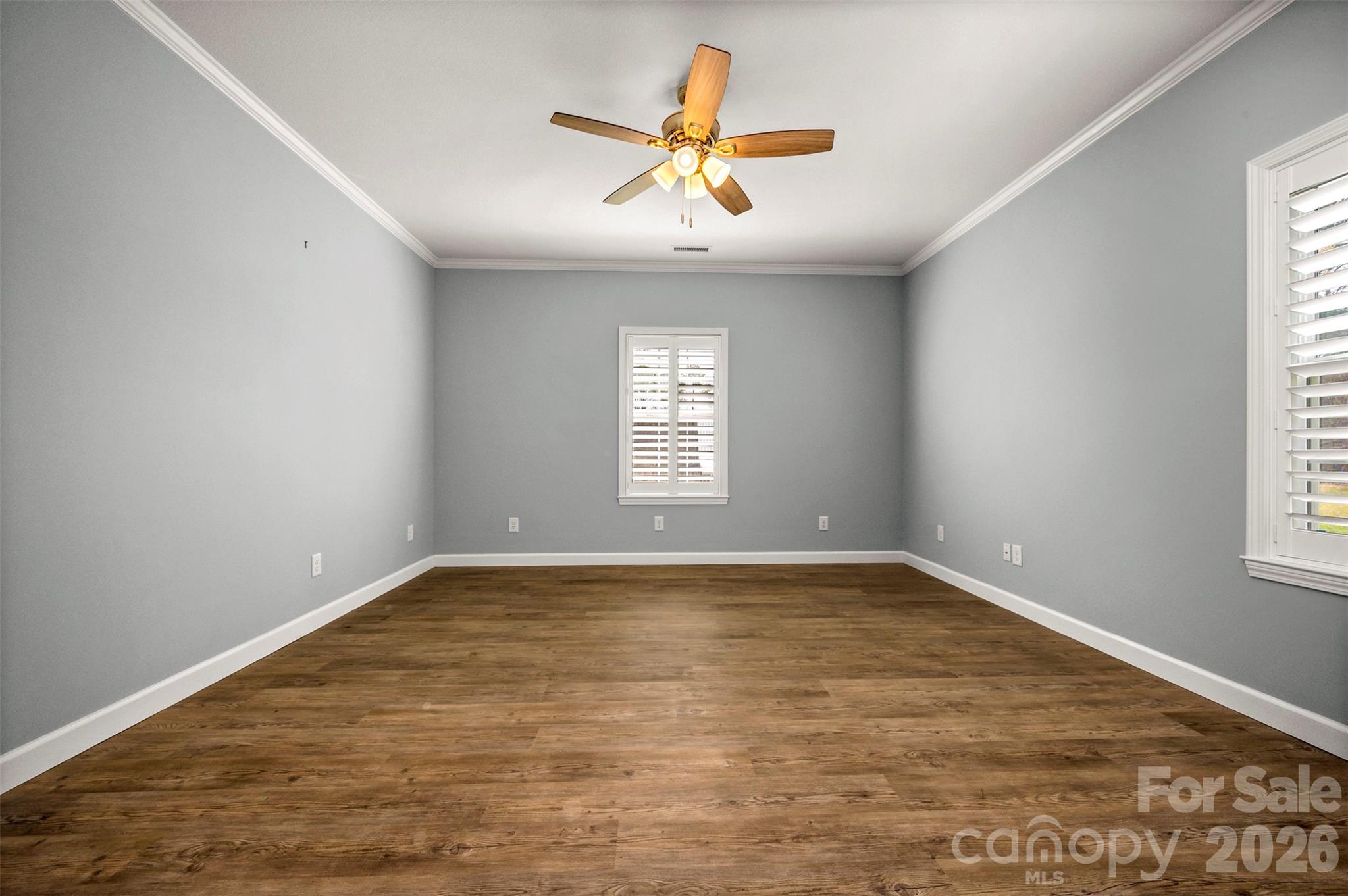 168 Nursery Road Forest City, NC 28043 - Photo 17 of 30 an empty room with window and ceiling fan