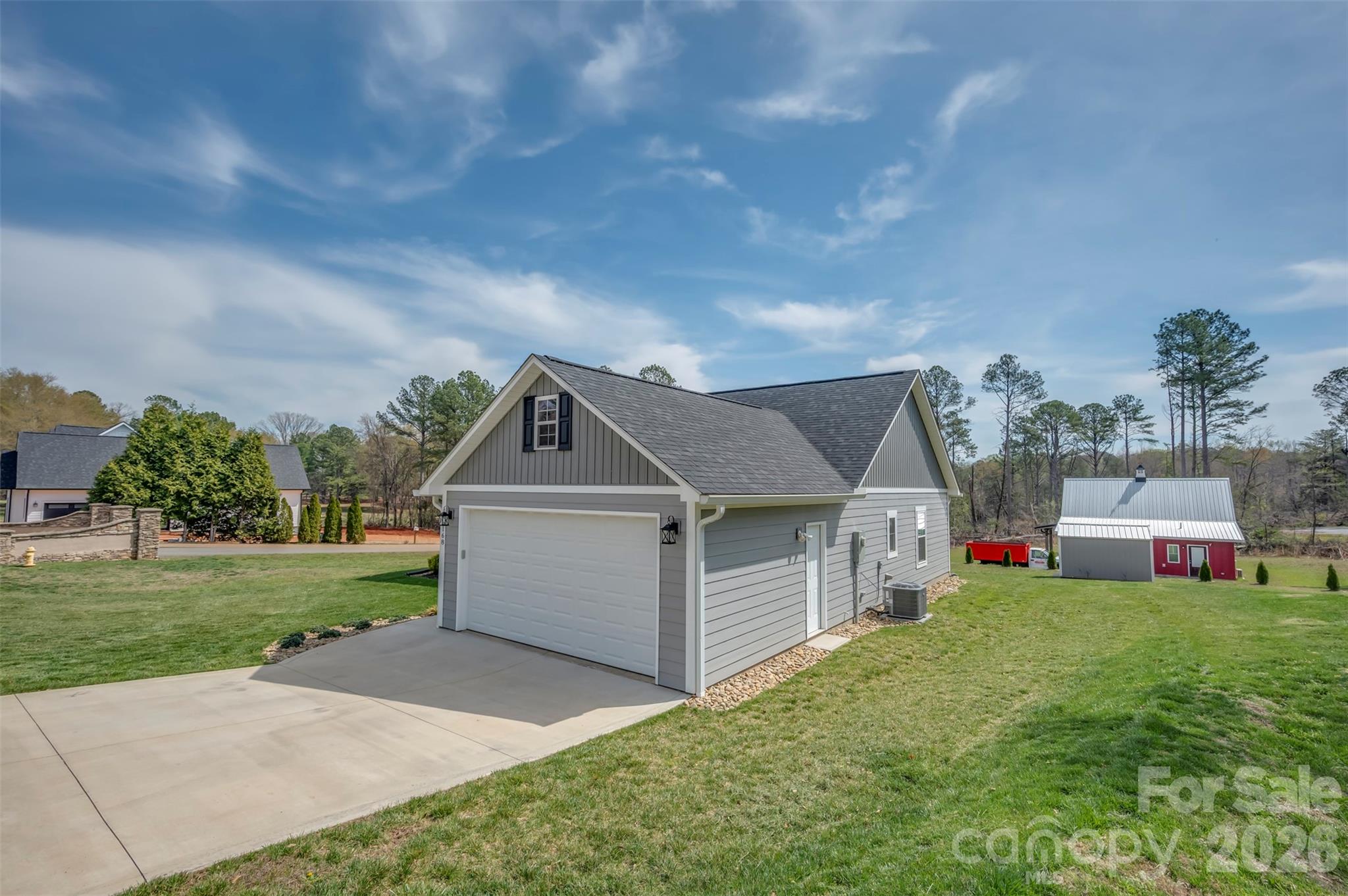 168 Nursery Road Forest City, NC 28043 - Photo 2 of 30 a view of a house with a yard and sitting area