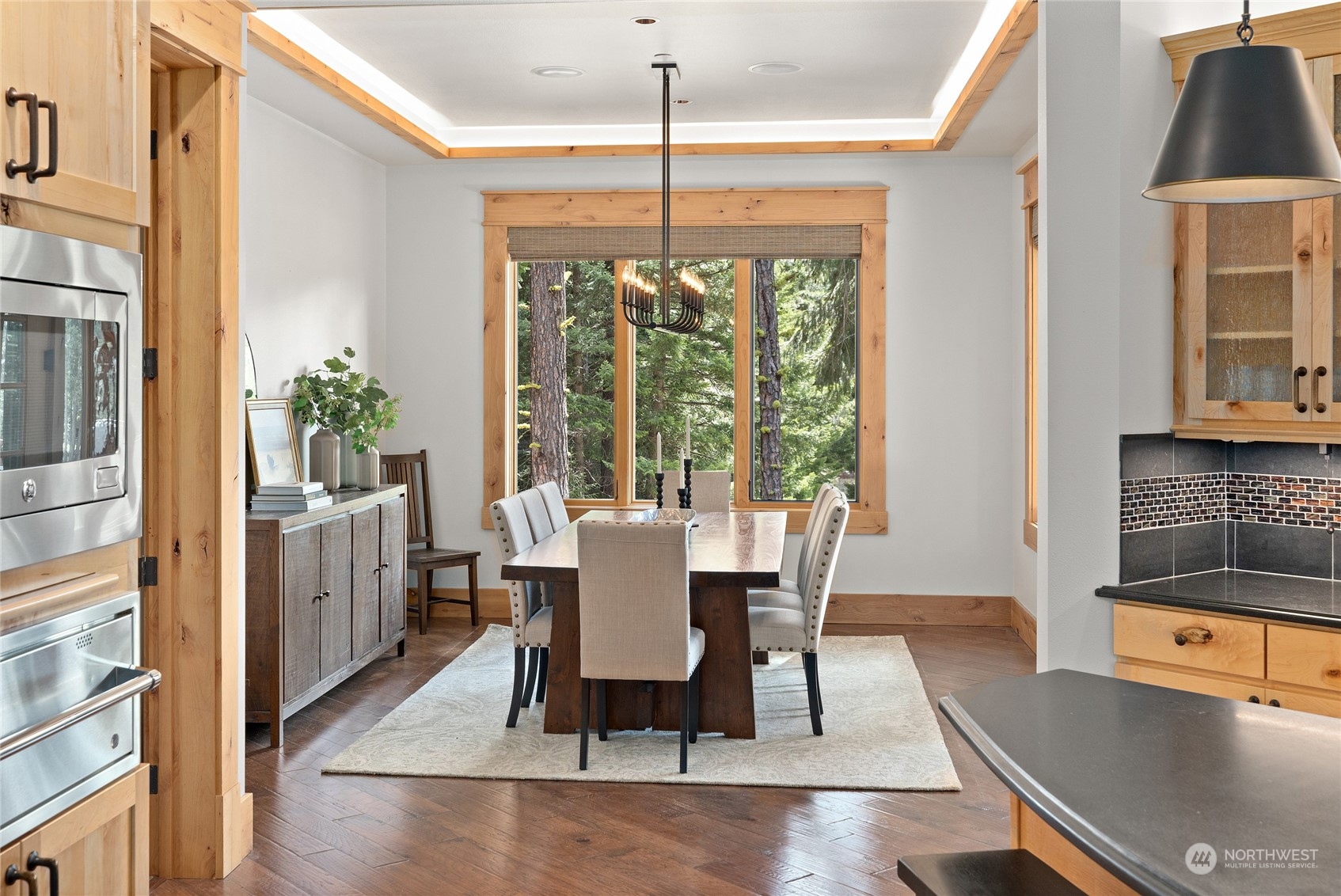 1491 Larkspur Loop Cle Elum, WA 98922 - Photo 11 of 40 a dining room with furniture and wooden floor