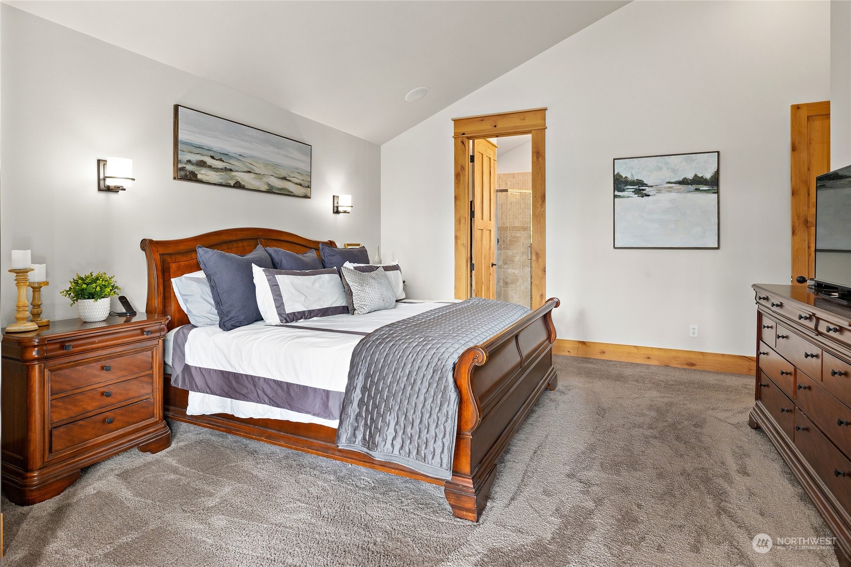 1491 Larkspur Loop Cle Elum, WA 98922 - Photo 17 of 40 a bedroom with a bed and a dresser in it