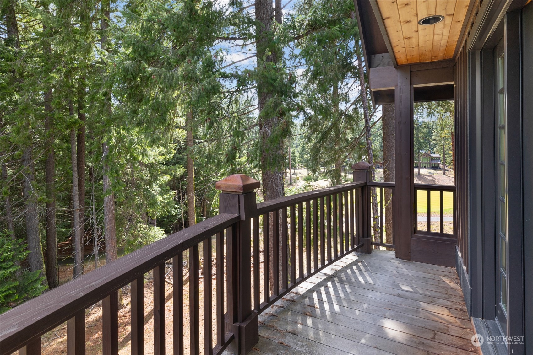 1491 Larkspur Loop Cle Elum, WA 98922 - Photo 27 of 40 a view of a balcony with wooden floor and outdoor space
