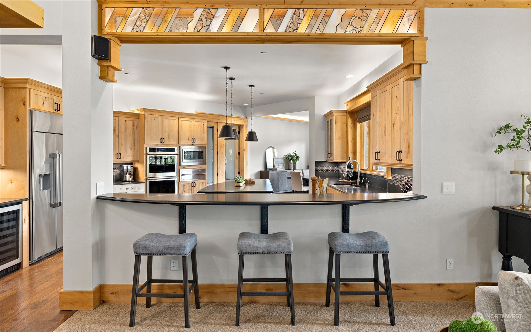 1491 Larkspur Loop Cle Elum, WA 98922 - Photo 7 of 40 a kitchen with chairs and window