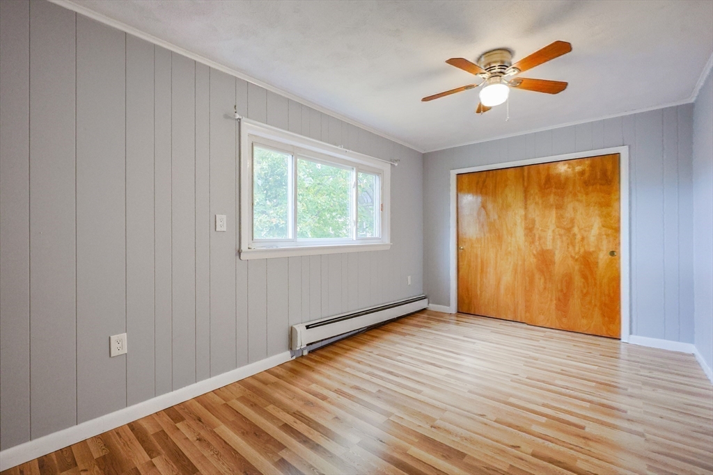 3 Vinal Street Somerville, MA 02145 - Photo 19 of 29 an empty room with wooden floor and windows
