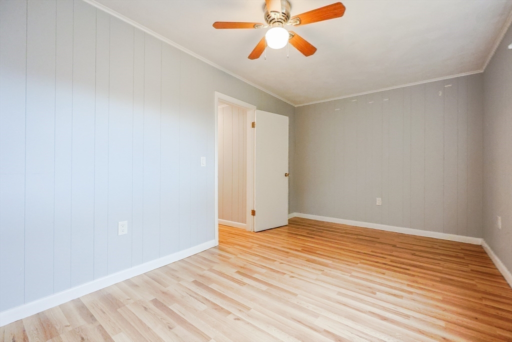 3 Vinal Street Somerville, MA 02145 - Photo 21 of 29 a view of an empty room with wooden floor