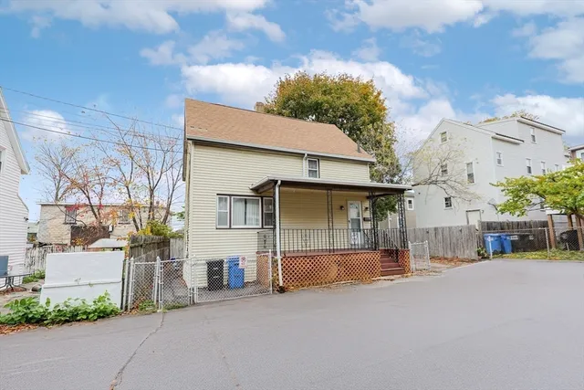 a view of a house with a street