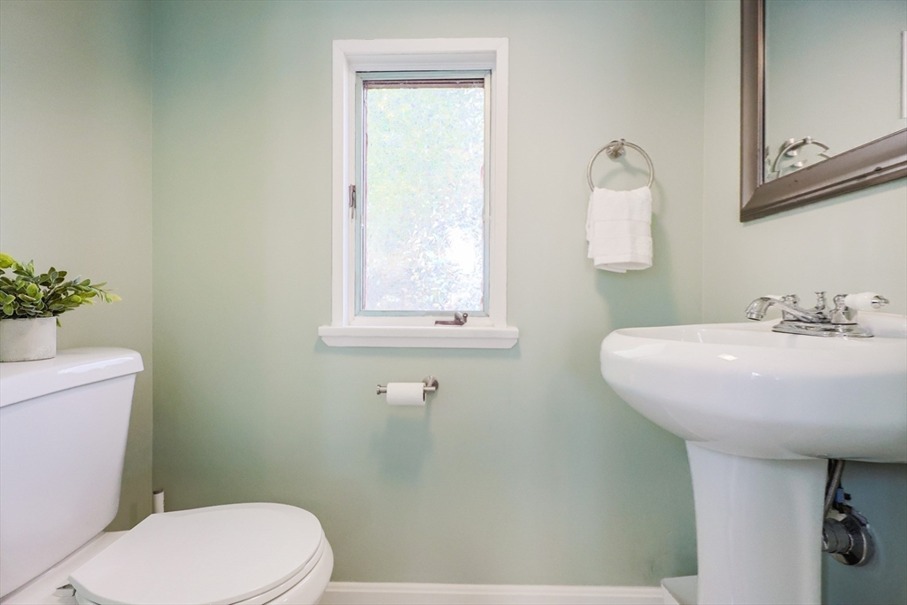 3 Vinal Street Somerville, MA 02145 - Photo 9 of 29 a bathroom with a sink mirror and toilet