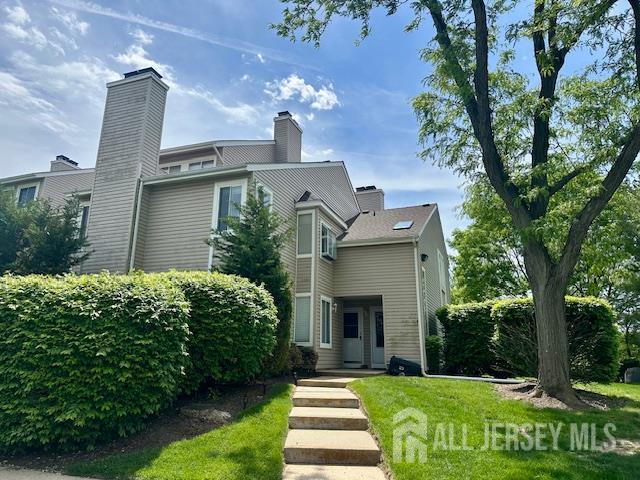 3 Farnham Square Parlin, NJ 08859 - Photo 1 of 31 a front view of a house with garden