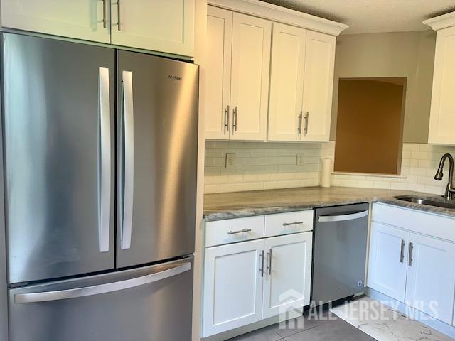 3 Farnham Square Parlin, NJ 08859 - Photo 15 of 31 a kitchen with appliances cabinets and a sink