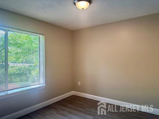 3 Farnham Square Parlin, NJ 08859 - Photo 17 of 31 a view of a small space with wooden floor and a window