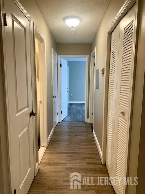 3 Farnham Square Parlin, NJ 08859 - Photo 20 of 31 a view of a hallway with wooden floor