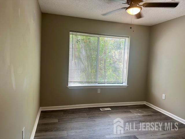 3 Farnham Square Parlin, NJ 08859 - Photo 21 of 31 an empty room with wooden floor and windows