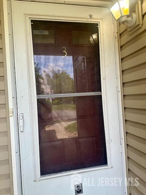 3 Farnham Square Parlin, NJ 08859 - Photo 3 of 31 a bathroom with a glass door and a window
