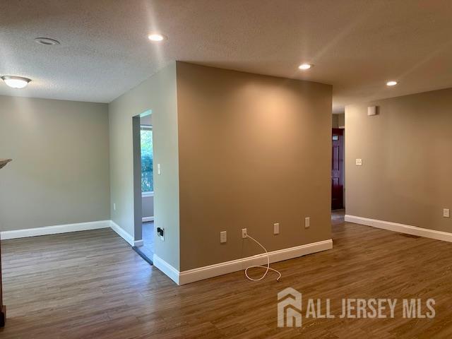 3 Farnham Square Parlin, NJ 08859 - Photo 7 of 31 an empty room with wooden floor