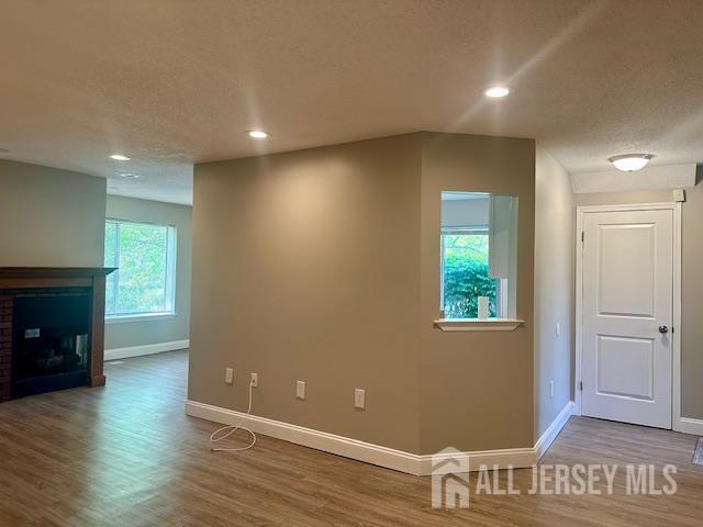 3 Farnham Square Parlin, NJ 08859 - Photo 9 of 31 an empty room with wooden floor and windows
