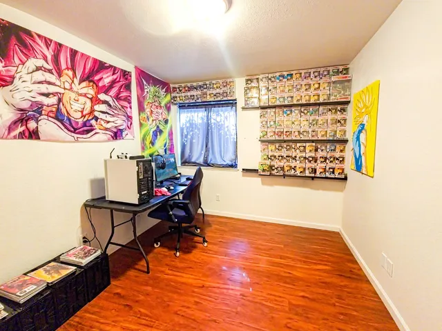 a living room with furniture rug and a window