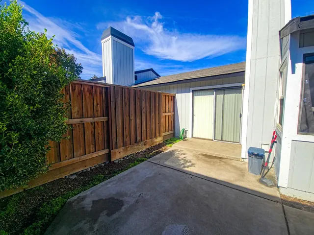 a view of backyard with cabin