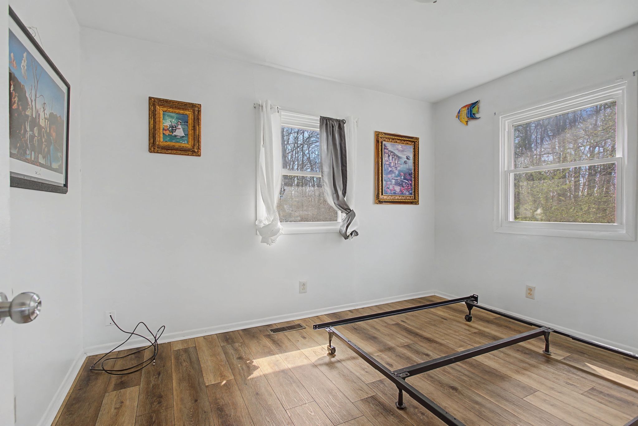 127 Rockhouse Road Hohenwald, TN 38462 - Photo 16 of 28 a room with a bed and a window