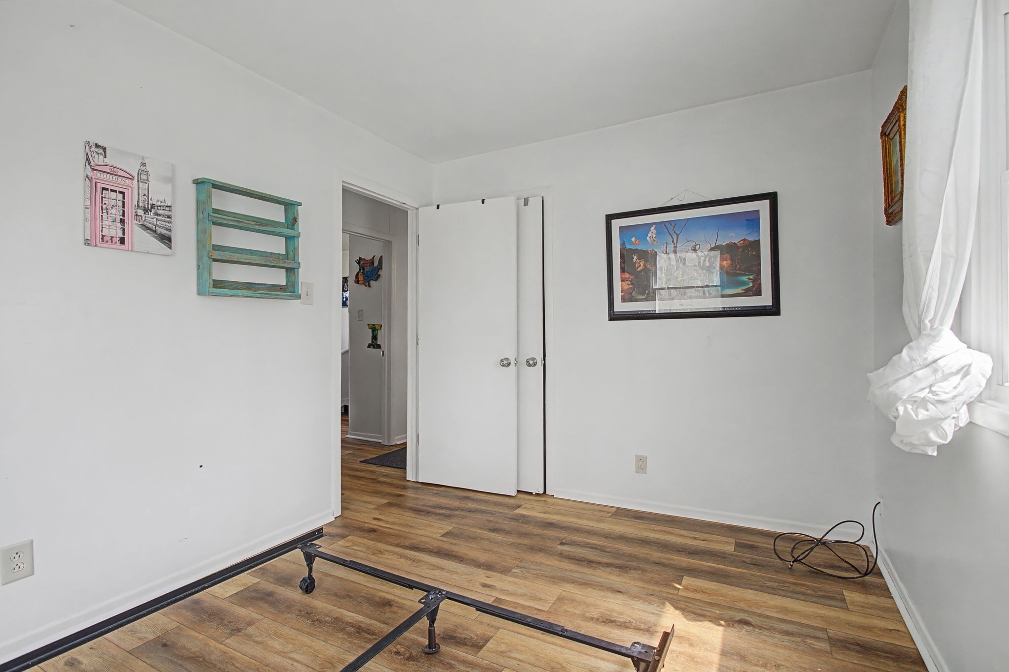 127 Rockhouse Road Hohenwald, TN 38462 - Photo 17 of 28 a view of room with hardwood floor and cabinet