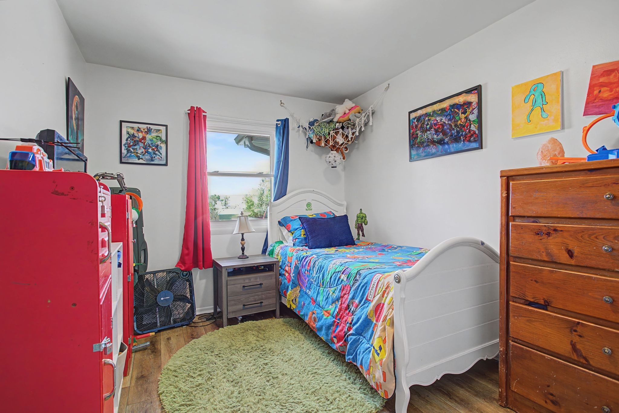 127 Rockhouse Road Hohenwald, TN 38462 - Photo 21 of 28 a bedroom with a bed and a closet