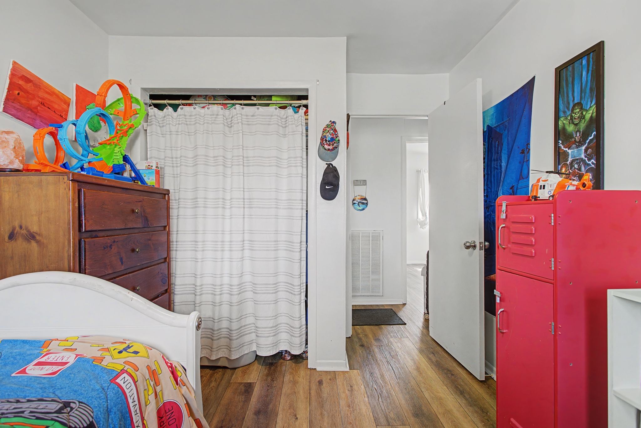 127 Rockhouse Road Hohenwald, TN 38462 - Photo 22 of 28 a bedroom with a bed and a couch