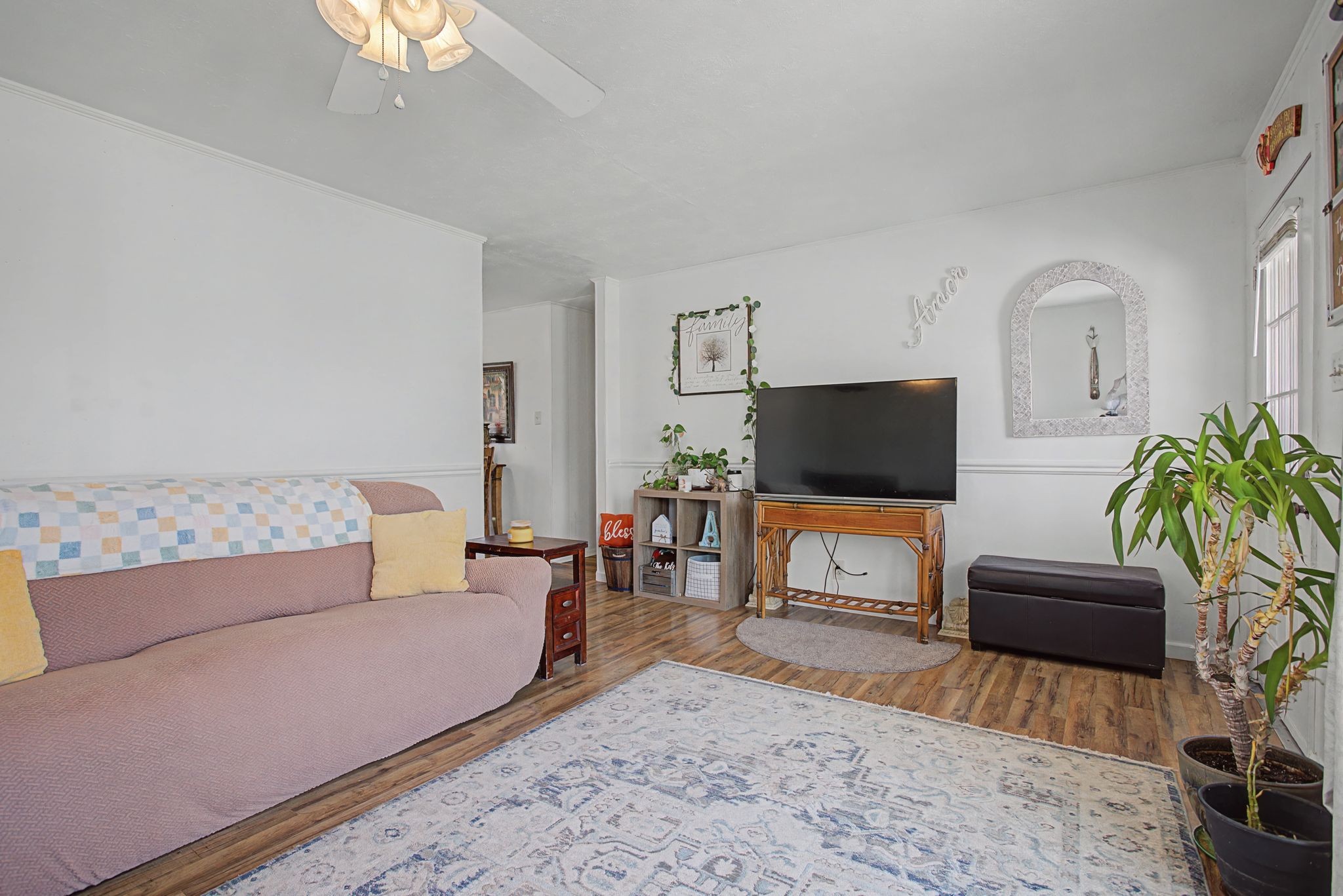 127 Rockhouse Road Hohenwald, TN 38462 - Photo 10 of 28 a living room with furniture and a flat screen tv