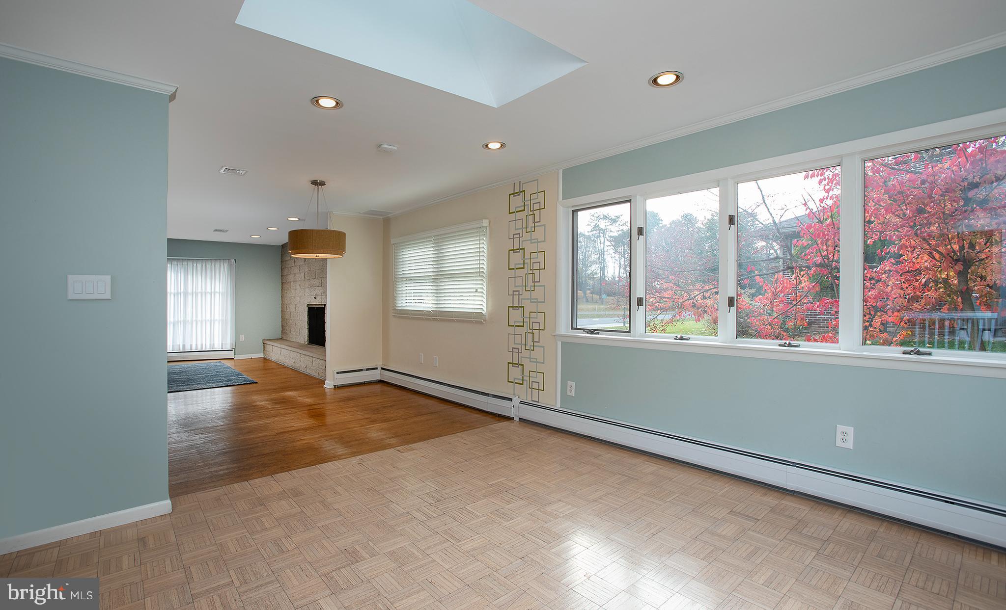 4310 Lakeview Road Harrisburg, PA 17112 - Photo 21 of 54 Sunroom looking into dining area and living room