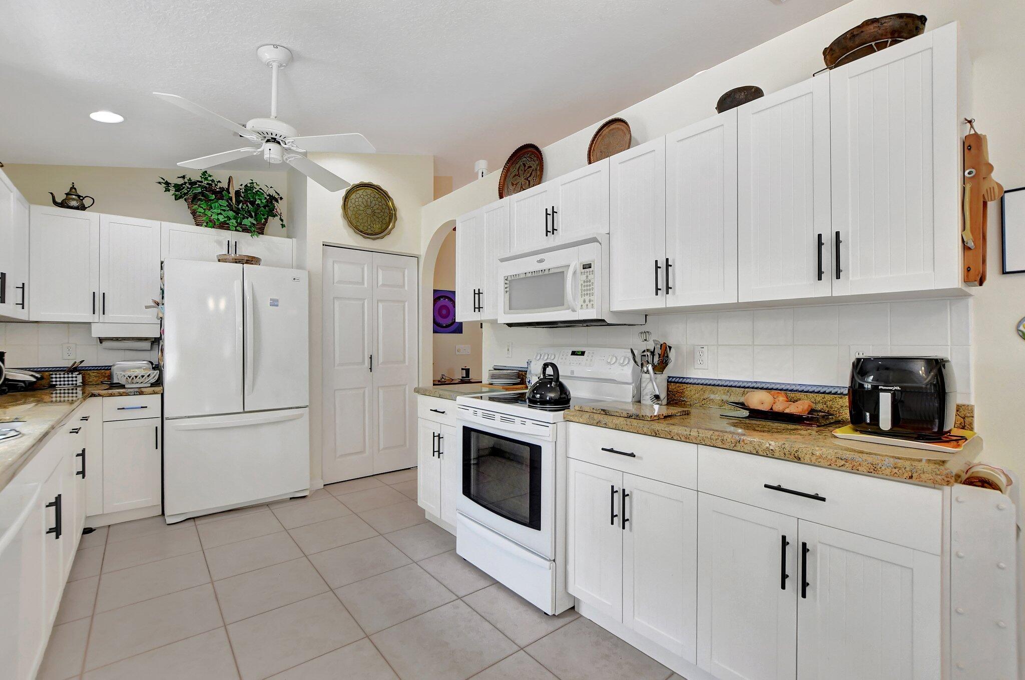 8853 Harrods Drive Boca Raton, FL 33433 - Photo 10 of 45 Kitchen