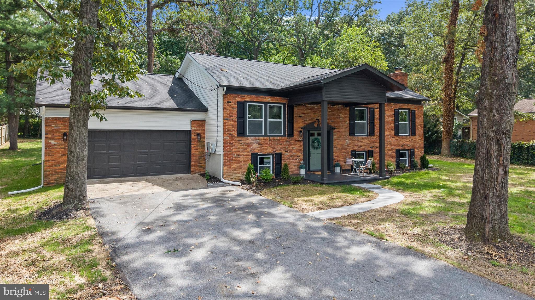 7851 Spruce Hill Road Severn, MD 21144 - Photo 4 of 55 Front View with Driveway