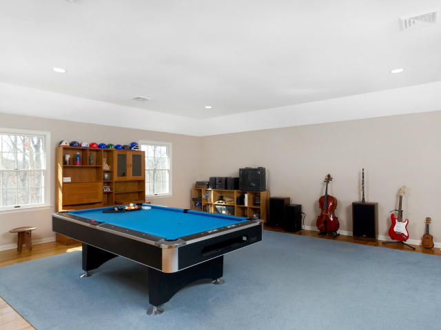 151 Ledges Road Ridgefield, CT 06877 - Photo 15 of 24 a living room with furniture pool table and window