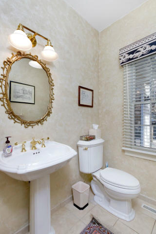 151 Ledges Road Ridgefield, CT 06877 - Photo 21 of 24 a bathroom with a sink a toilet and mirror