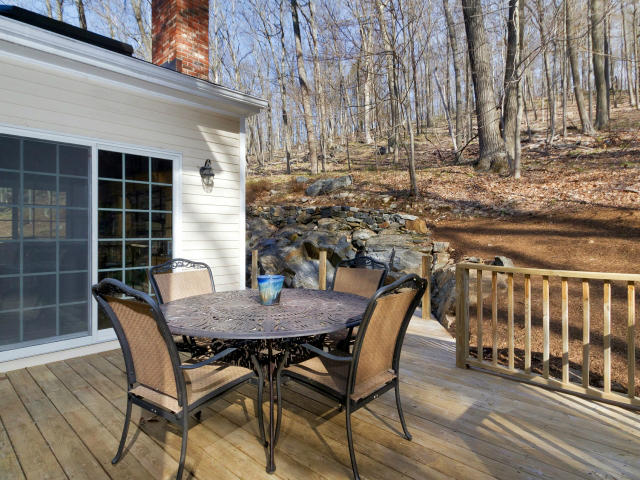 151 Ledges Road Ridgefield, CT 06877 - Photo 24 of 24 a view of a chairs and table on the wooden floor