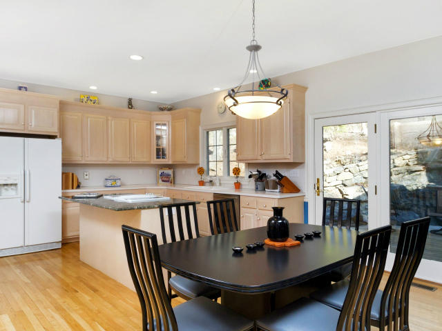 151 Ledges Road Ridgefield, CT 06877 - Photo 6 of 24 a view of a dining room with furniture window and outside view