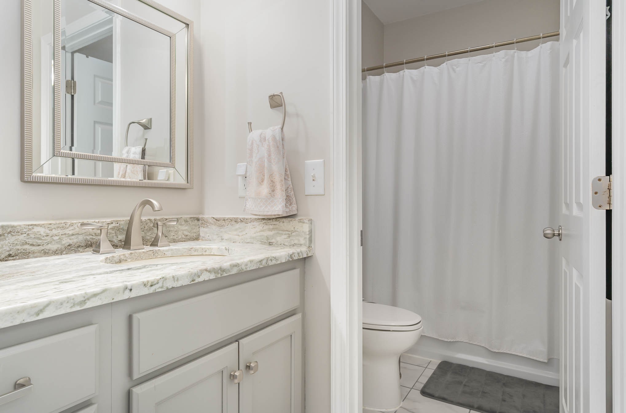 2010 Sunflower Drive Spring Hill, TN 37174 - Photo 11 of 20 a bathroom with a granite countertop sink toilet and shower