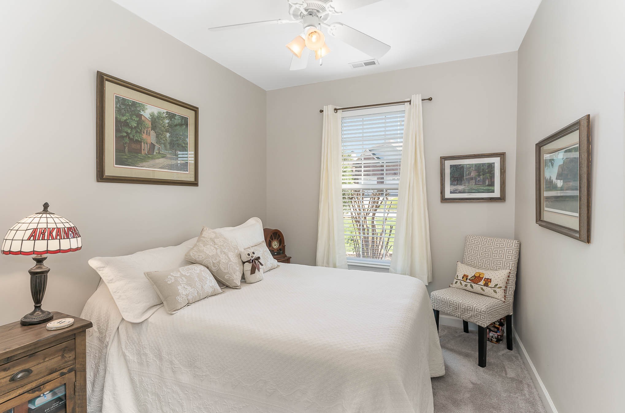 2010 Sunflower Drive Spring Hill, TN 37174 - Photo 12 of 20 a bedroom with a bed and a chandelier