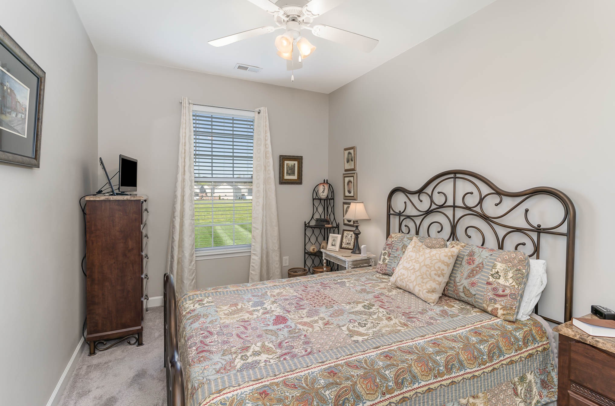 2010 Sunflower Drive Spring Hill, TN 37174 - Photo 13 of 20 a bedroom with a large bed and a window