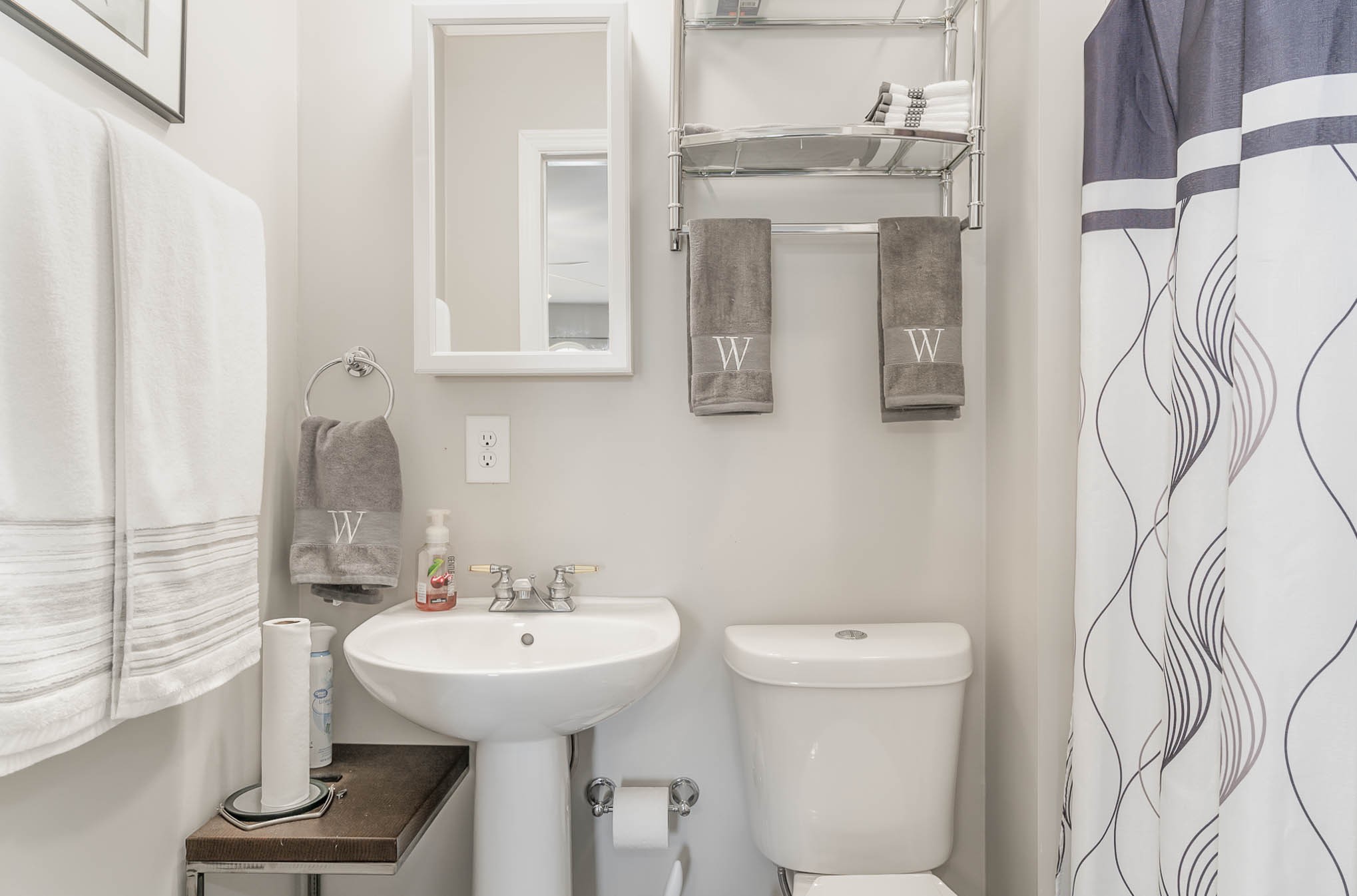 2010 Sunflower Drive Spring Hill, TN 37174 - Photo 18 of 20 a bathroom with a sink and mirror with toilet