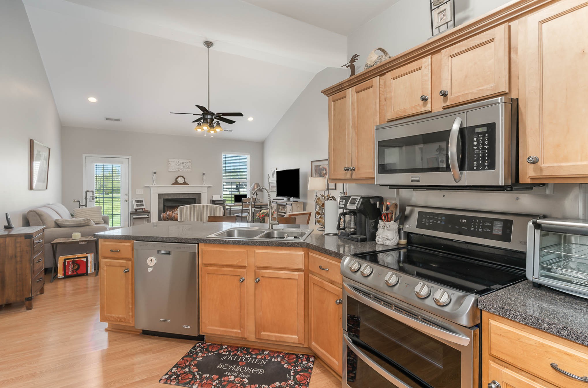2010 Sunflower Drive Spring Hill, TN 37174 - Photo 5 of 20 a kitchen with stainless steel appliances granite countertop a stove and a microwave