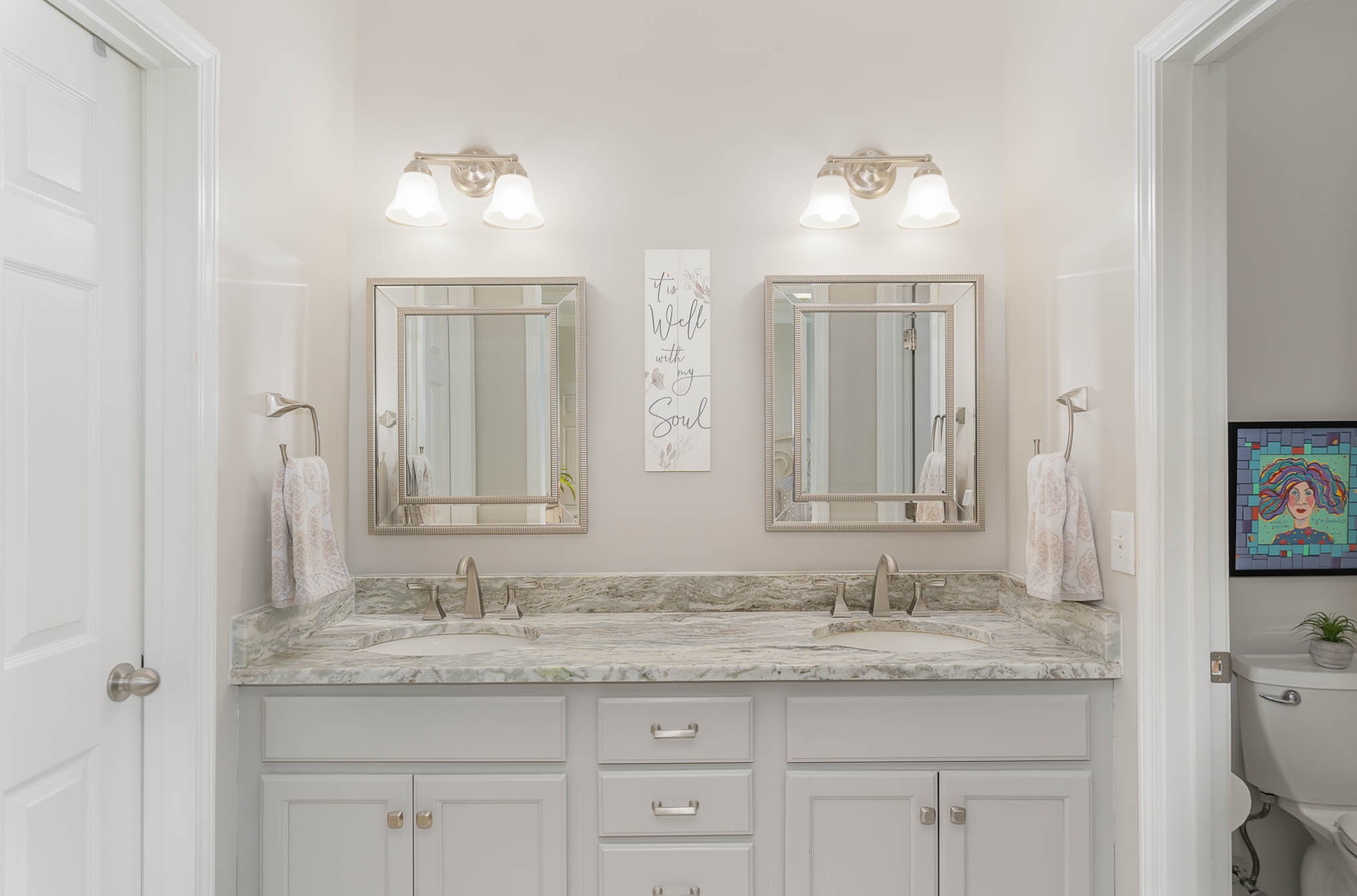 2010 Sunflower Drive Spring Hill, TN 37174 - Photo 10 of 20 a bathroom with a granite countertop double vanity sink and a mirror