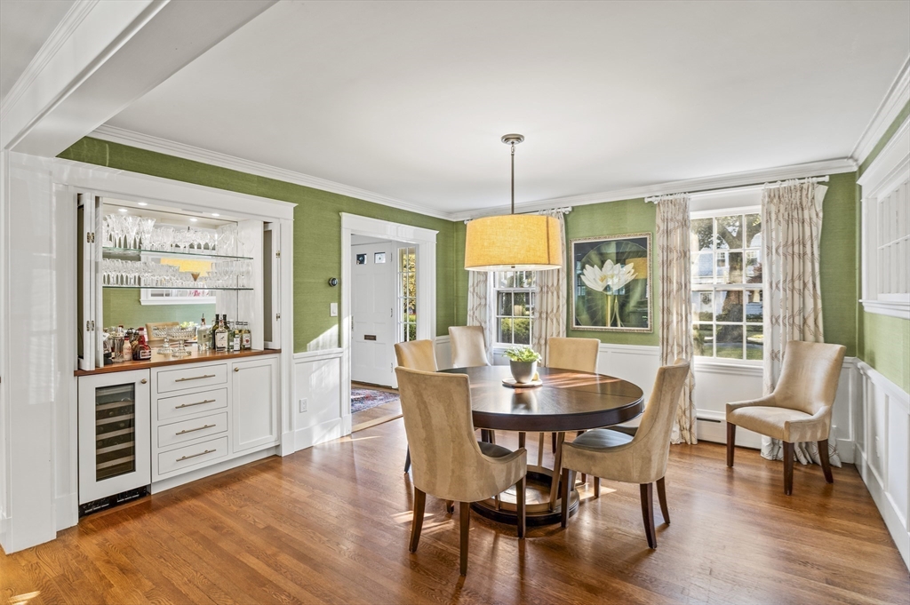 19 Elmwood Road Marblehead, MA 01945 - Photo 14 of 36 a dining room with furniture a chandelier and wooden floor