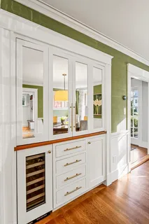 a view of a kitchen with cabinets