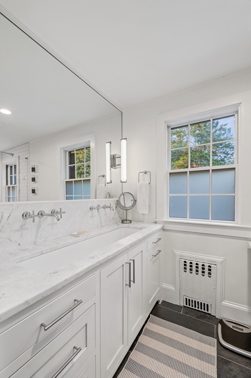 19 Elmwood Road Marblehead, MA 01945 - Photo 20 of 36 a spacious bathroom with a sink and a window