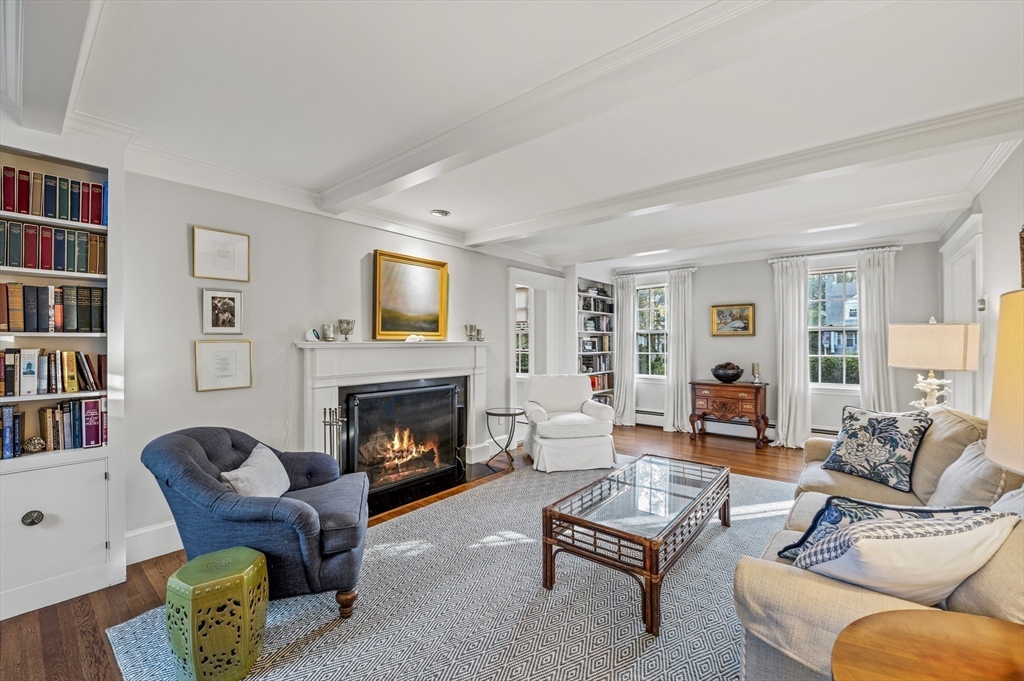 19 Elmwood Road Marblehead, MA 01945 - Photo 2 of 36 a living room with furniture fireplace and book shelf