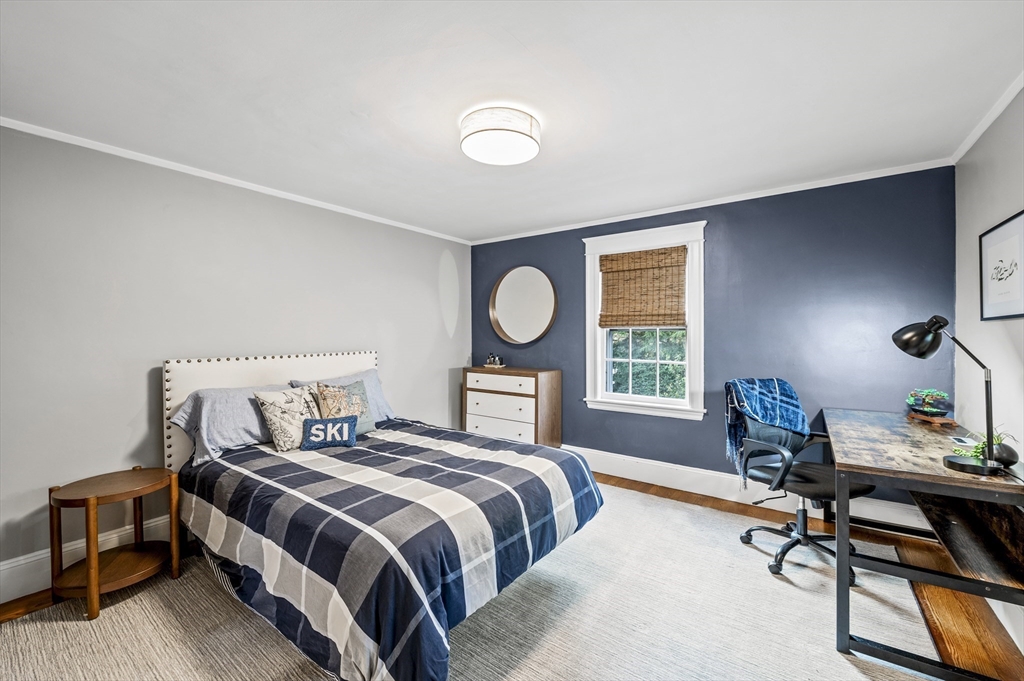 19 Elmwood Road Marblehead, MA 01945 - Photo 22 of 36 a bedroom with a bed and a window