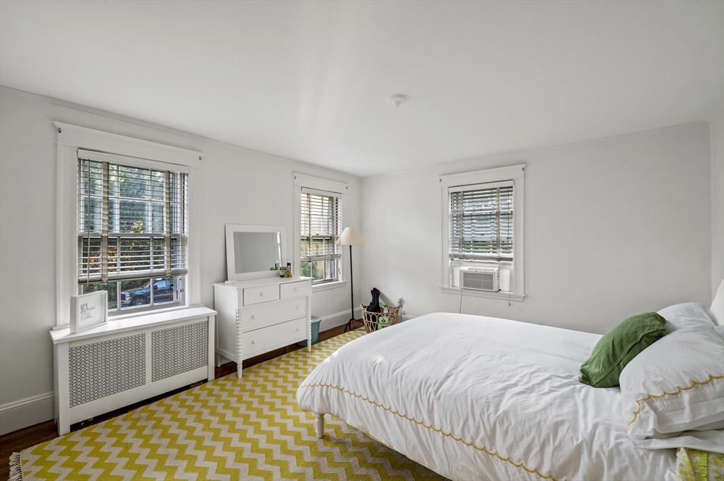 19 Elmwood Road Marblehead, MA 01945 - Photo 23 of 36 a bedroom with a bed and a window