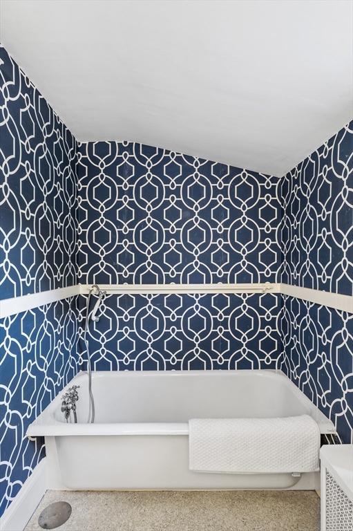 19 Elmwood Road Marblehead, MA 01945 - Photo 27 of 36 a bathroom with a bathtub and shower