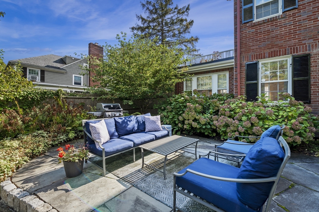 19 Elmwood Road Marblehead, MA 01945 - Photo 30 of 36 a view of a patio with couches chairs and a potted plant