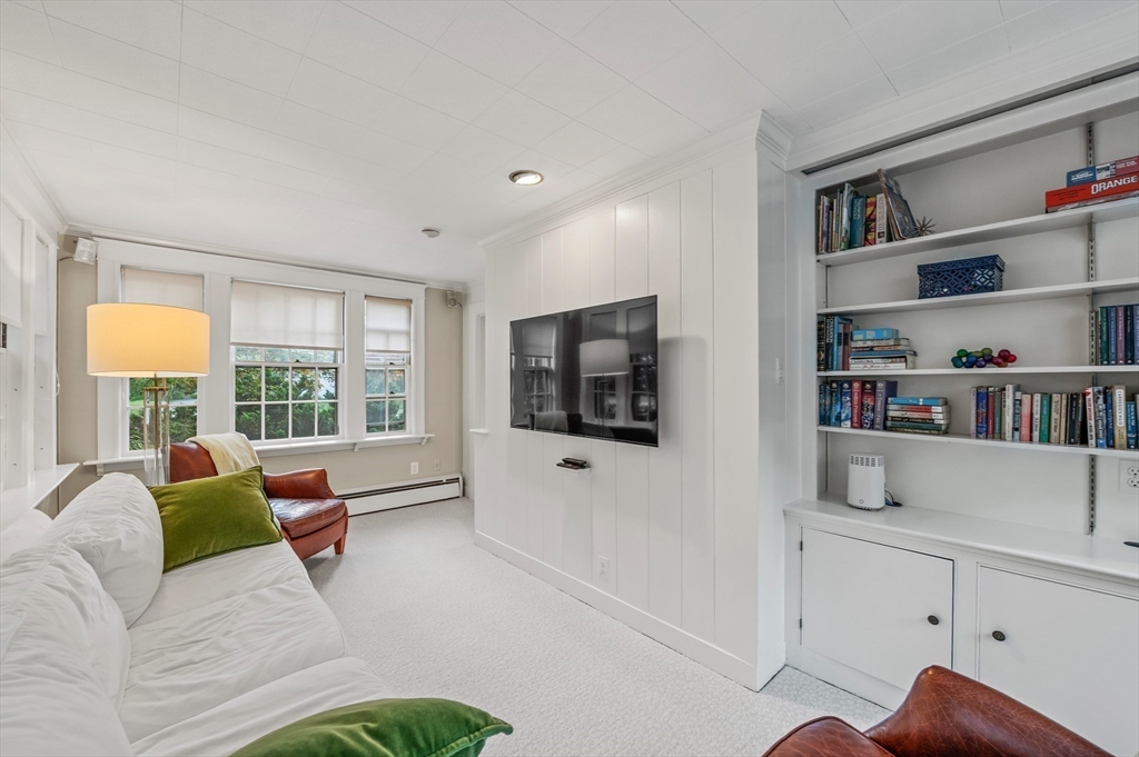 19 Elmwood Road Marblehead, MA 01945 - Photo 5 of 36 a living room with furniture and a flat screen tv