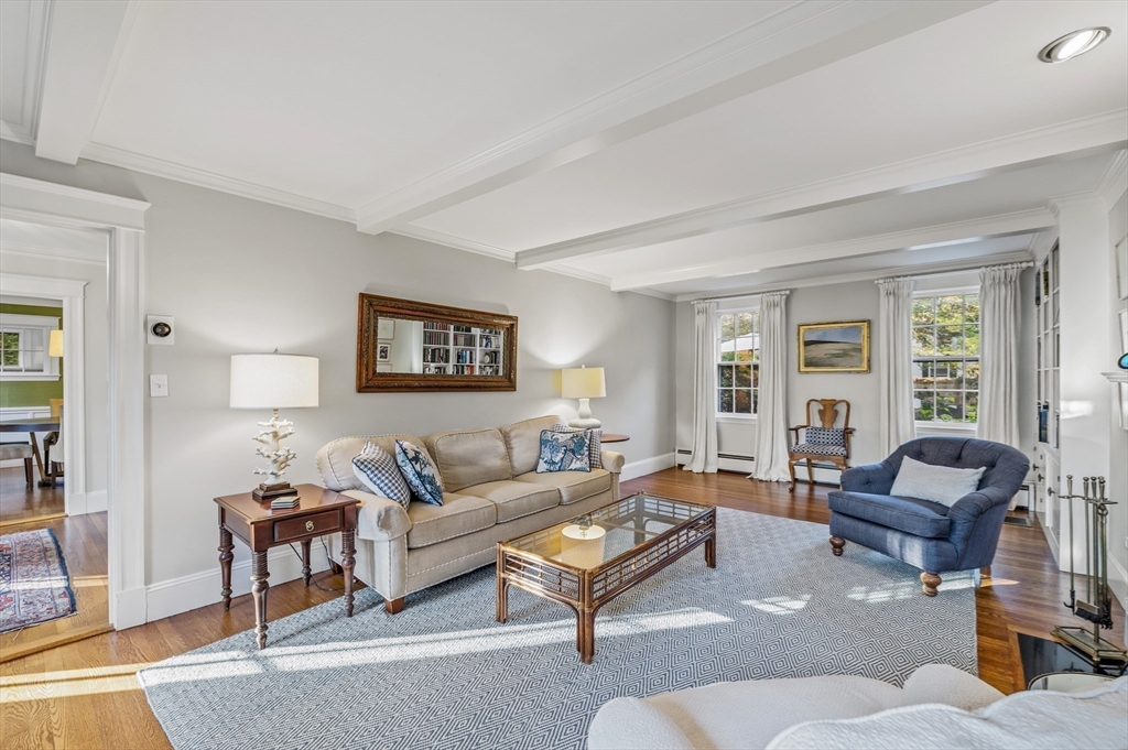 19 Elmwood Road Marblehead, MA 01945 - Photo 6 of 36 a living room with furniture a rug a lamp and a window