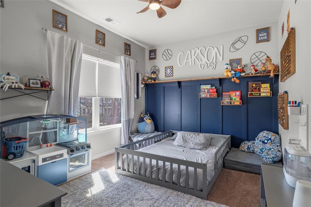 329 Rippling Drive Ball Ground, GA 30107 - Photo 22 of 43 a bedroom with furniture and a window
